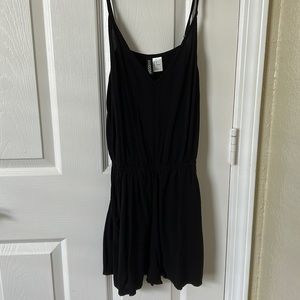 Black romper, divided h & m, size 6, never worn , adjustable straps